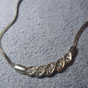 Gold and pave necklace